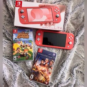 Nintendo Switch Lite Coral Handheld Console with Coral Color - Includes 2 Games